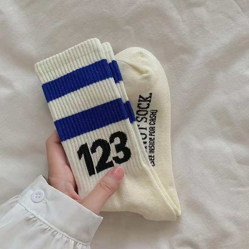 fashion design logo jacquard knitted custom athletic striped cotton sport socks