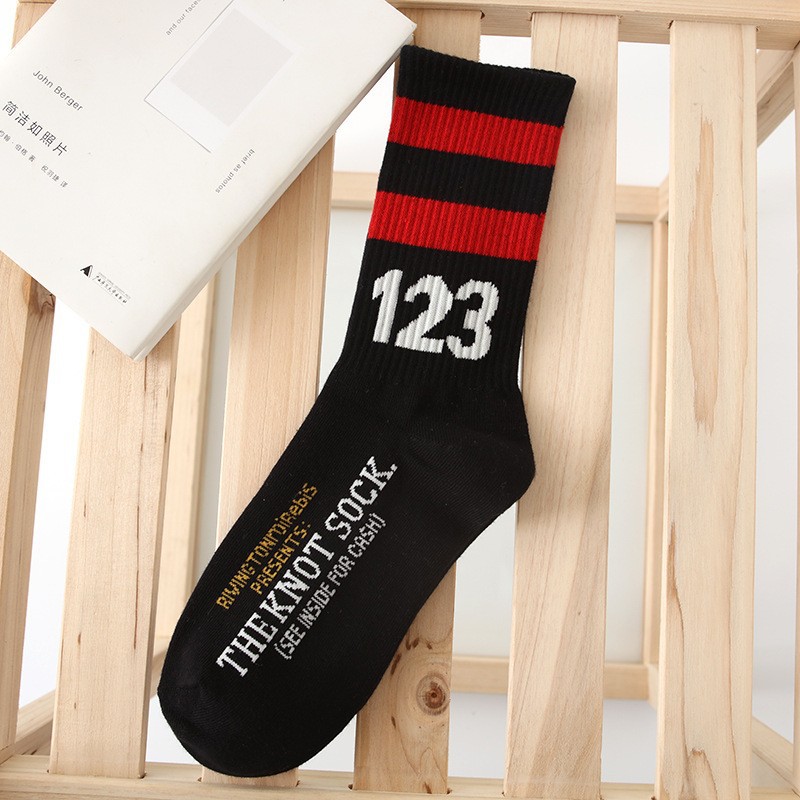 fashion design logo jacquard knitted custom athletic striped cotton sport socks